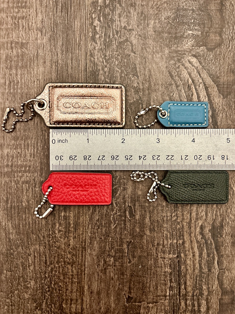 4 Coach Leather Bag Hang Tags with Ball and Chains. Metallic, Red, Black & Blue